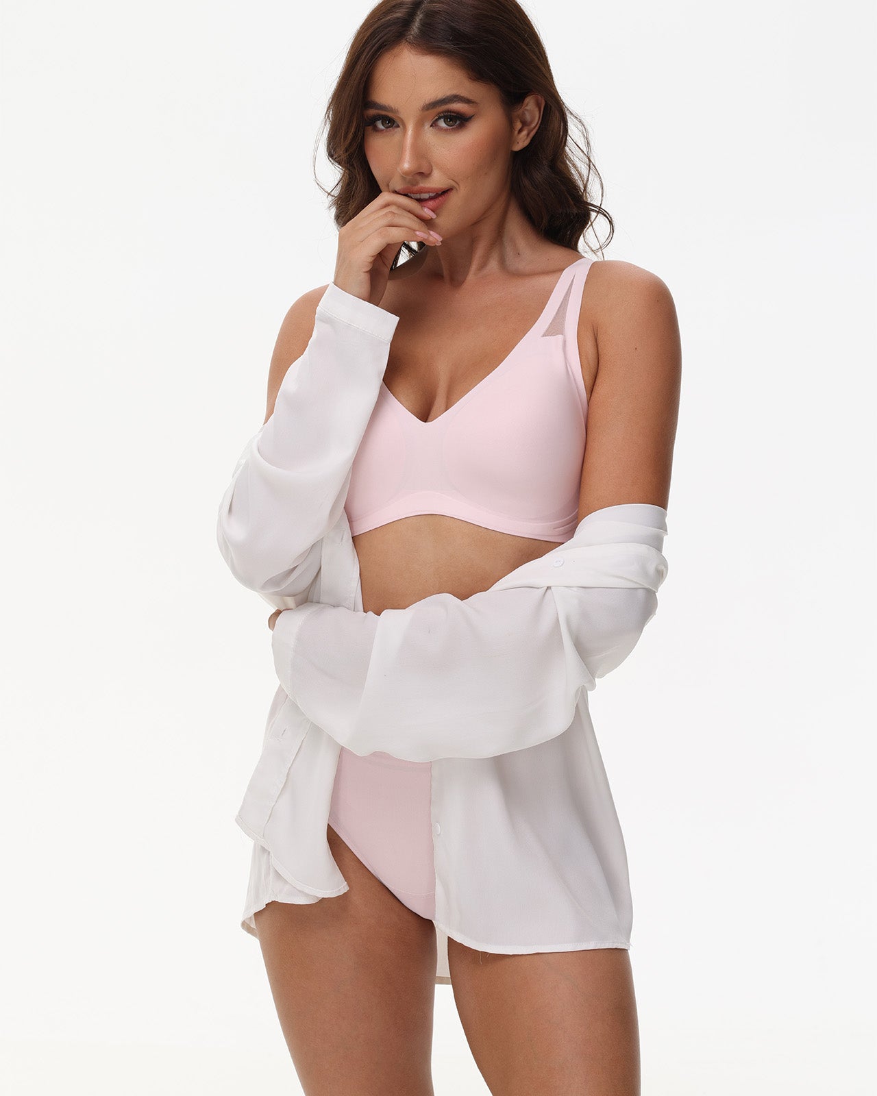 Model wears Wingslove pink deep V seamless bra under clothing, ideal for yoga or sleep