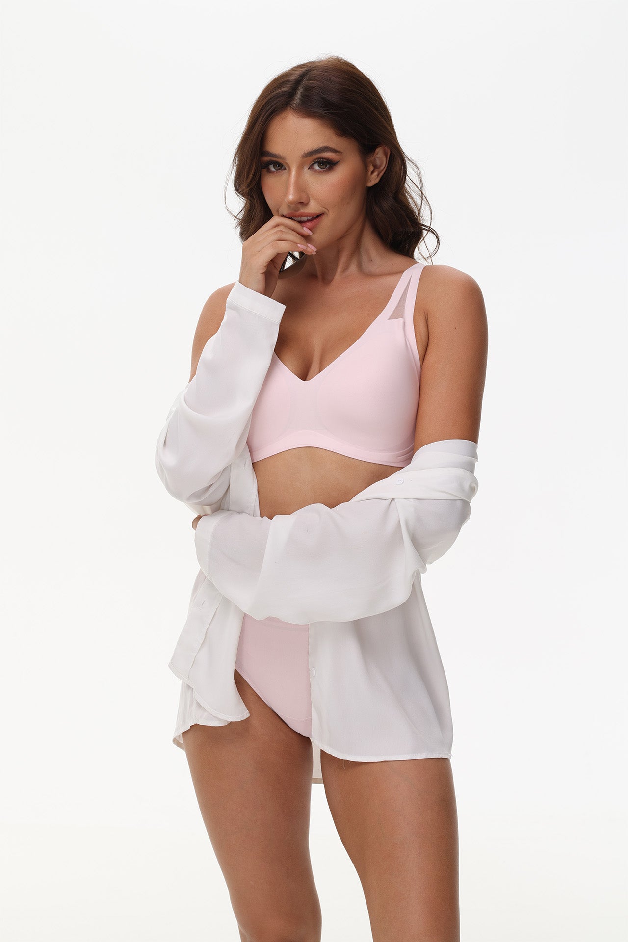 Model wears Wingslove pink deep V seamless bra under clothing, ideal for yoga or sleep